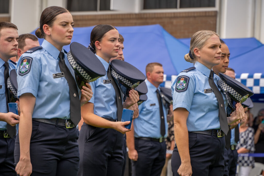 new female police officers in formation during the graduation
